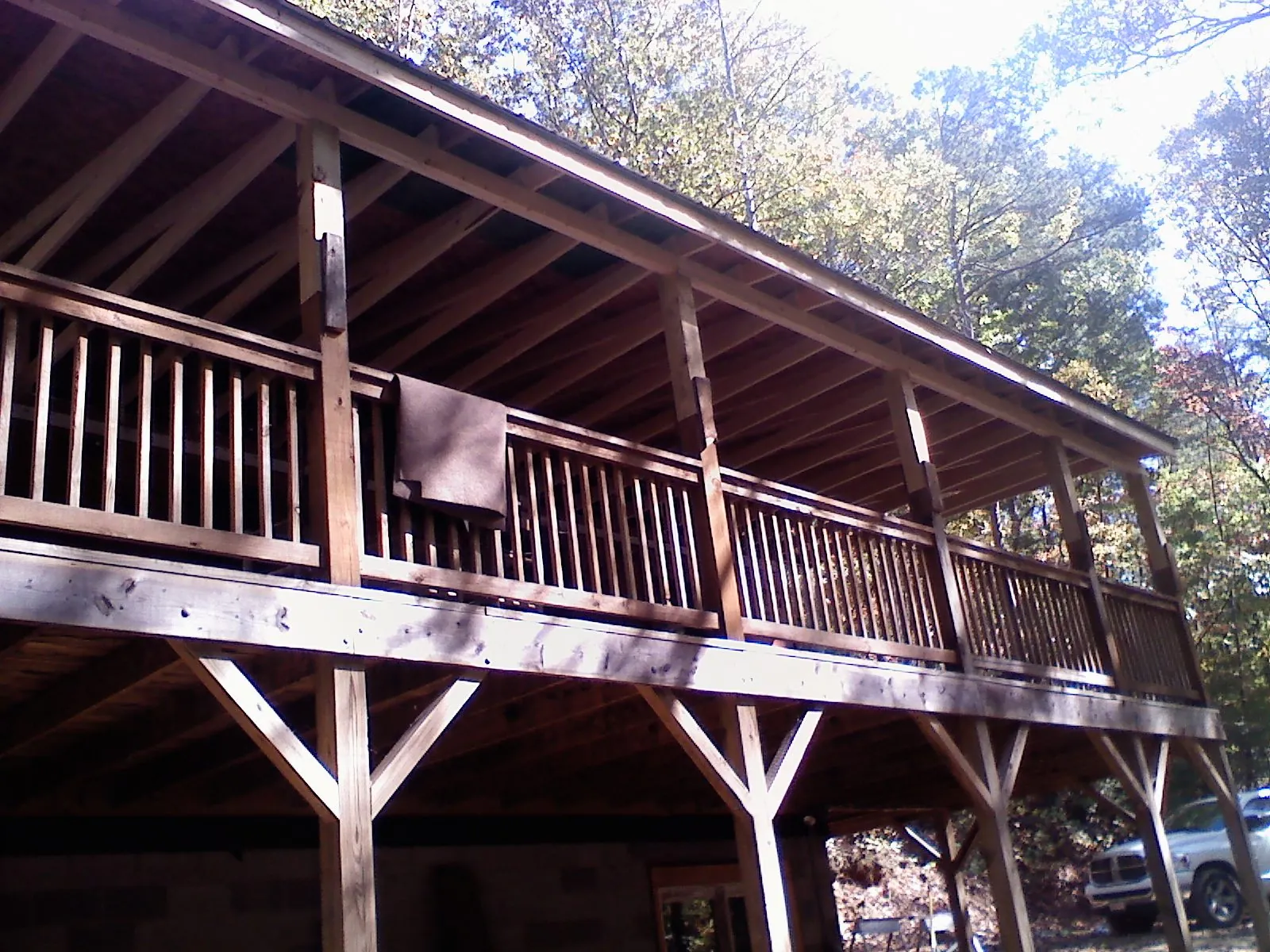 Timber framing under a new elevated porch and deck — Roof Leak Repair in East Liverpool by Roofing Brothers